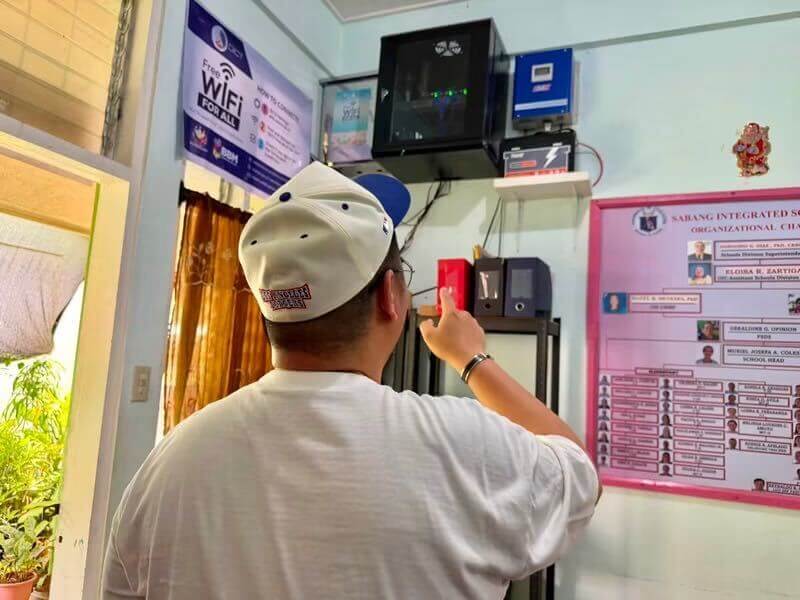 Project team reviewing the connectivity setup at Sabang Integrated School